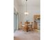 Charming dining area adjacent to kitchen, showcasing natural light and cozy ambiance at 3360 Cactus Shadow St # 203, Las Vegas, NV 89129