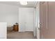 Entryway with carpet, storage and a paneled front door and sidelight at 3360 Cactus Shadow St # 203, Las Vegas, NV 89129