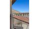 Exterior stairwell with a view of neighboring rooftops and mountains at 3360 Cactus Shadow St # 203, Las Vegas, NV 89129