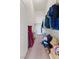 Walk-in closet features ample shelving for storage and organization at 3360 Cactus Shadow St # 203, Las Vegas, NV 89129