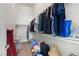 Walk-in closet features ample shelving for storage and organization at 3360 Cactus Shadow St # 203, Las Vegas, NV 89129