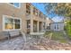 Landscaped backyard featuring a seating area, string lights and a well maintained lawn at 368 Misty Moonlight St, Henderson, NV 89015