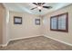 Comfortable bedroom featuring plush carpet, neutral walls, and shuttered windows at 368 Misty Moonlight St, Henderson, NV 89015