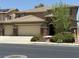 Two story home featuring a three car garage and stone accents at 368 Misty Moonlight St, Henderson, NV 89015