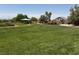 Beautiful community park featuring a grassy area, covered picnic structure, and a colorful play set at 368 Misty Moonlight St, Henderson, NV 89015