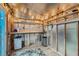 Inside a finished shed with workbench, insulation, lighting, shelving and tool storage at 368 Misty Moonlight St, Henderson, NV 89015