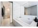 Bright bathroom featuring a modern soaking tub, and an adjacent glass shower at 3726 Las Vegas Blvd # 2410, Las Vegas, NV 89158