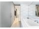 Bright bathroom featuring a modern soaking tub, closet, and an adjacent glass shower at 3726 Las Vegas Blvd # 2410, Las Vegas, NV 89158
