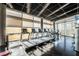Bright gym with multiple treadmills, weights, and city views at 3726 Las Vegas Blvd # 2410, Las Vegas, NV 89158