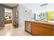 Open kitchen features stainless appliances and access to full bathroom, perfect for modern living and functionality at 3726 Las Vegas Blvd # 2410, Las Vegas, NV 89158