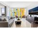 Spacious living room featuring sleek furniture and city views at 3726 Las Vegas Blvd # 2410, Las Vegas, NV 89158