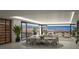 Modern dining area with city views, stylish lighting, and an elegant wine storage unit at 400 Rock Peak Dr # 2301, Henderson, NV 89012