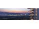 Modern high-rise building with multiple balconies offering panoramic views of the Las Vegas skyline at 400 Rock Peak Dr # 2301, Henderson, NV 89012
