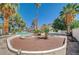 Backyard showcasing mature palm trees, a well-maintained patio area, and ample space for outdoor enjoyment at 4030 Del Monte Ave, Las Vegas, NV 89102