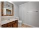 Bathroom featuring a classic vanity, toilet, mirror, and shower at 4030 Del Monte Ave, Las Vegas, NV 89102