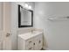 Bathroom vanity with white cabinet and gold hardware at 4030 Del Monte Ave, Las Vegas, NV 89102