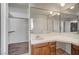 Bathroom with an expansive mirror, double sinks, and lots of storage at 4030 Del Monte Ave, Las Vegas, NV 89102