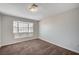 Bright bedroom featuring a bay window and plush carpeting at 4030 Del Monte Ave, Las Vegas, NV 89102