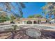 Charming single-story home with a three-car garage and decorative metalwork at 4030 Del Monte Ave, Las Vegas, NV 89102