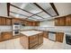 Kitchen with a stainless steel oven and dishwasher, granite countertops and island at 4030 Del Monte Ave, Las Vegas, NV 89102