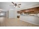 Open-concept living space with tile flooring, recessed lighting, and view into the kitchen at 4030 Del Monte Ave, Las Vegas, NV 89102