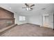 Inviting living room with fireplace, neutral carpet, and ample space for entertaining at 4030 Del Monte Ave, Las Vegas, NV 89102