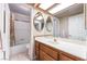 Bathroom featuring a white countertop, framed mirrors, and bathtub with shower at 4378 Cherrystone Ct, Las Vegas, NV 89121
