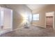 Carpeted bedroom with vaulted ceilings, a window, and access to closets at 4378 Cherrystone Ct, Las Vegas, NV 89121