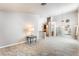 Bright, open-concept living room with tile flooring, and a clear view of the kitchen at 4378 Cherrystone Ct, Las Vegas, NV 89121