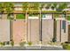 Drone shot of home and neighborhood showcasing a rectangular layout and adjacent swimming pool at 4511 Stardusk Falls Ave, North Las Vegas, NV 89084