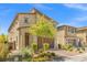 Charming two-story home with desert landscaping, a two-car garage, and great curb appeal at 4511 Stardusk Falls Ave, North Las Vegas, NV 89084
