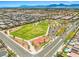 A park area showcases a basketball court, play area, and green spaces within the residential community at 4511 Stardusk Falls Ave, North Las Vegas, NV 89084