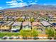 A sunny street view displays well-kept homes with varied architectural styles and landscaping details at 4511 Stardusk Falls Ave, North Las Vegas, NV 89084