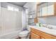 Functional bathroom featuring a tub/shower combination, vanity, and medicine cabinet at 5109 Gains Mill St, Las Vegas, NV 89122