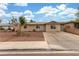 Charming single-story home with desert landscaping and a spacious driveway at 5109 Gains Mill St, Las Vegas, NV 89122