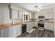 Functional kitchen features wood countertops, stainless steel appliances, and gray cabinets at 5109 Gains Mill St, Las Vegas, NV 89122