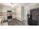 Bright kitchen with stainless steel appliances and wood countertops is spacious at 5109 Gains Mill St, Las Vegas, NV 89122