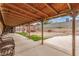 Covered patio offering a view of the backyard, ideal for relaxing and entertaining at 5109 Gains Mill St, Las Vegas, NV 89122