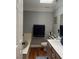 Well-lit bathroom featuring a bathtub and a single vanity with a white sink at 5165 Briar Meadow Way, Las Vegas, NV 89118