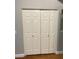 A linen closet with four white paneled doors at 5165 Briar Meadow Way, Las Vegas, NV 89118