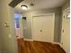 Inviting entryway featuring hardwood floors and a closet for convenient storage at 5165 Briar Meadow Way, Las Vegas, NV 89118