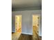 Hallway with two doors, one to the bathroom and one to the closet at 5165 Briar Meadow Way, Las Vegas, NV 89118