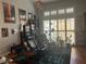 Comfortable living room filled with plants and movie-themed decor, illuminated by natural light at 5165 Briar Meadow Way, Las Vegas, NV 89118