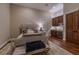 Comfortable bedroom featuring a wet bar, wood floors, and neutral tones at 52 Innisbrook Ave, Las Vegas, NV 89113