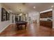 Entertaining game room with pool table and bar area on the main floor at 52 Innisbrook Ave, Las Vegas, NV 89113