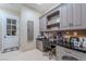 Inviting home office with custom cabinetry, a built-in desk, and ample storage at 52 Innisbrook Ave, Las Vegas, NV 89113