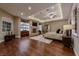 Spacious main bedroom featuring tray ceilings, and hardwood floors at 52 Innisbrook Ave, Las Vegas, NV 89113