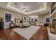 Luxurious main bedroom suite with fireplace and sitting area at 52 Innisbrook Ave, Las Vegas, NV 89113