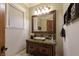 Chic powder room with marble countertop, vessel sink, and stylish vanity at 52 Innisbrook Ave, Las Vegas, NV 89113