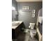 A functional bathroom with a sink, vanity, and combined shower and bathtub at 5804 Balzar Ave, Las Vegas, NV 89108